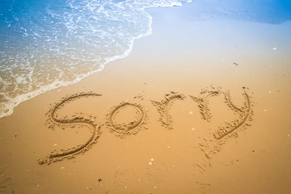 Scritto in una spiaggia tropicale sabbiosa — Foto Stock