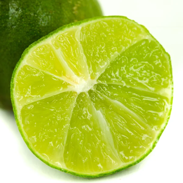 Fresh lime and slice, Isolated on white background — Stock Photo, Image