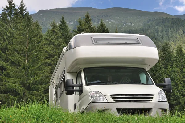 Camper parked in the countryside Royalty Free Stock Photos