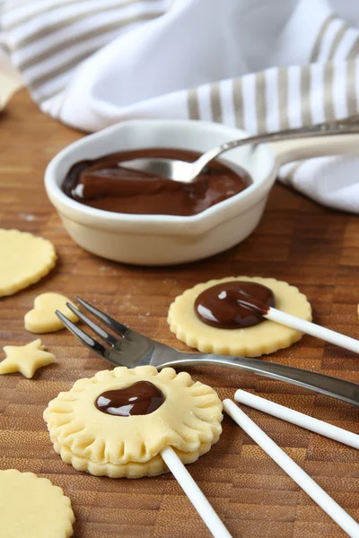 Process of baking shortbread cookies pops with chocolate — Stock Photo, Image