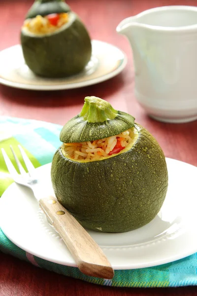 Roasted round zucchini stuffed rice and vegetables — Stock Photo, Image