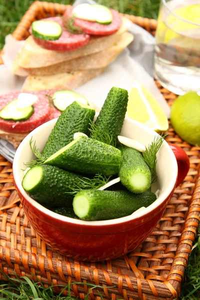 Homemade fresh salted cucumbers and sandwiches with sausage — Stock Photo, Image