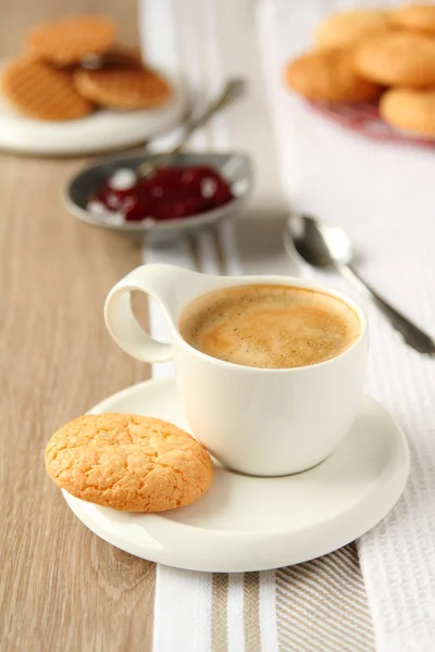 Cup of espresso with coconut cookies on a plate — Stock Photo, Image