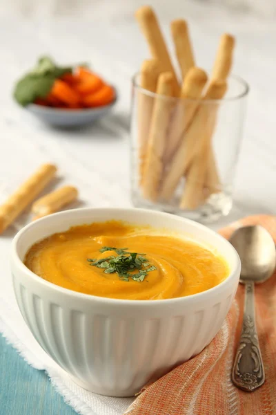 Bowl of homemade carrot soup with coconut milk and coriander — Stock Photo, Image