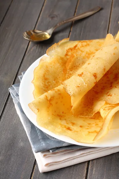 Gluten free crepes from rice flour, potato starch and millet flour with honey — Stock Image Gluten free crepes from rice flour, potato starch and millet flour with honey Stock Image