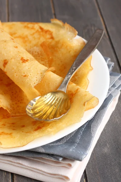 Gluten free crepes from rice flour, potato starch and millet flour with honey — Stock Image Gluten free crepes from rice flour, potato starch and millet flour with honey Royalty Free Stock Photos