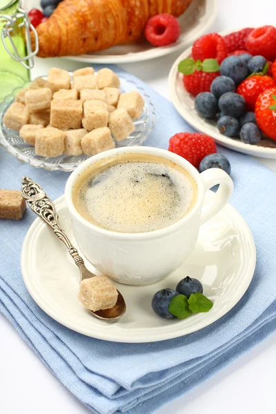 Breakfast with cup of coffee, croissants and berries — Stock Photo, Image