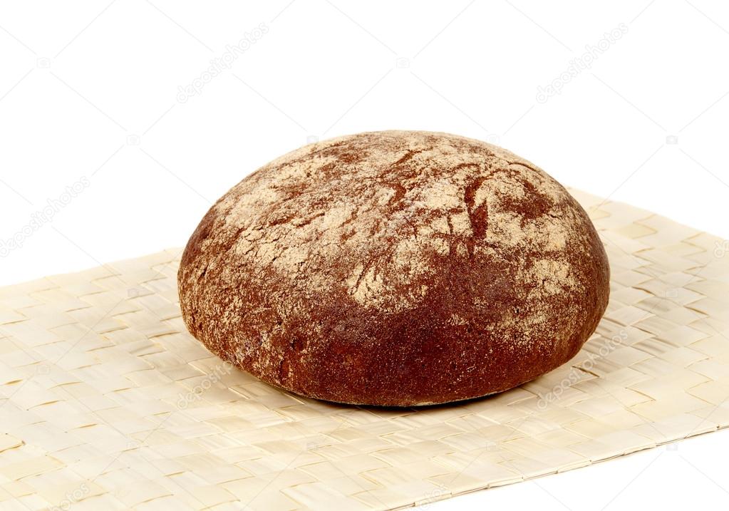 An oval loaf of rye bread