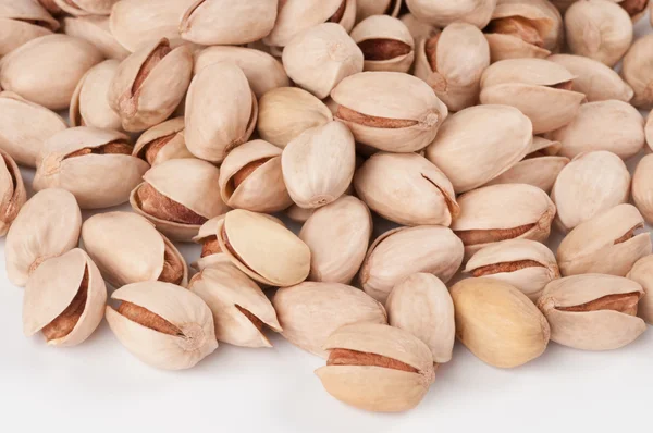 Many natural pistachios — Stock Photo, Image