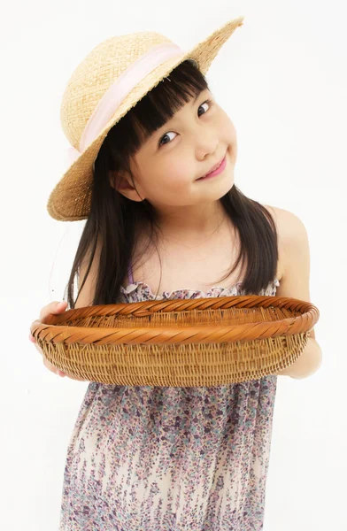 Little girl with basket — Stock Photo, Image