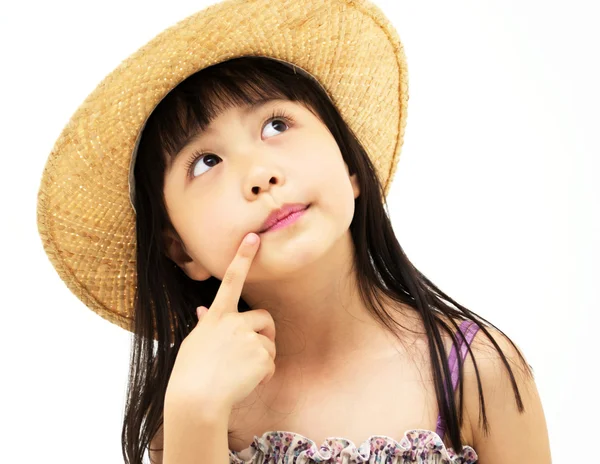 Красивая азиатская маленькая девочка думает — стоковое фото