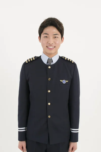 Asian airline pilot — Stock Photo, Image