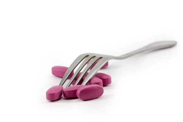 Fork on the pill — Stock Photo, Image