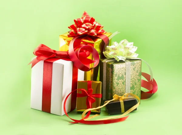 Wrapped presents with bows and ribbons — Stock Photo, Image