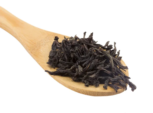 Wooden spoon black Tea — Stock Photo, Image