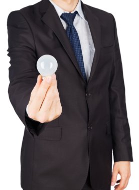 ampul tutan takım elbiseli adam