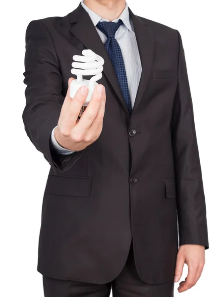 Man in suit with bulb — Stock Photo, Image