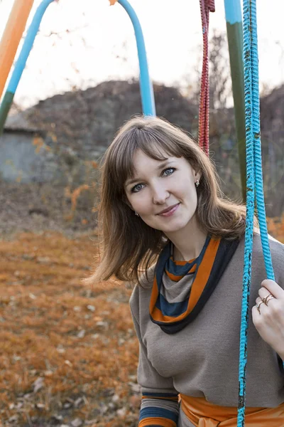 Woman on swing — Stock Photo, Image