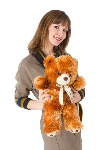 Женщина с игрушечным медведем — стоковое фото
