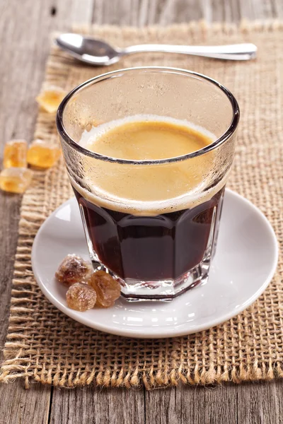 Чёрный кофе в стакане — стоковое фото