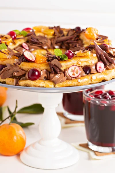 Paris-Brest cake with chocolate and tangerines — Stock Photo, Image