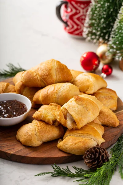 Christmas appetizers, fig jam filled crescent rolls — Stock Photo, Image