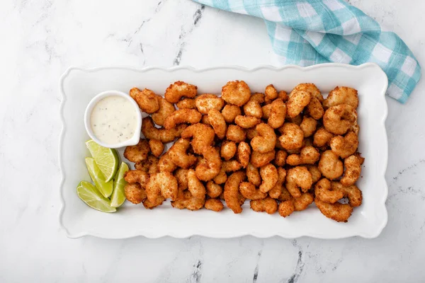 Hindistan cevizli karides ve limon dilimi, aperatif fikir.