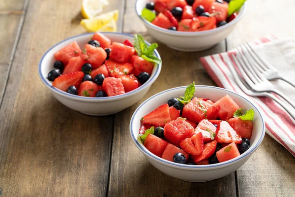 Juicy Refreshing Summer Fruit Salad Watermelon Strawberries Blueberries Lemon Mint — Fotografia de Stock