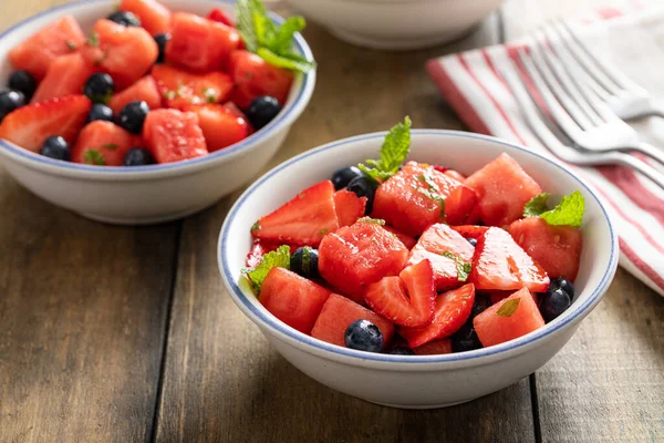 Juicy Refreshing Summer Fruit Salad Watermelon Strawberries Blueberries Lemon Mint — Fotografia de Stock