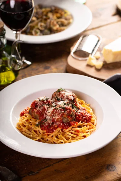 Spaghetti Meatballs Marinara Sauce Served Red Wine Wooden Table — стоковое фото