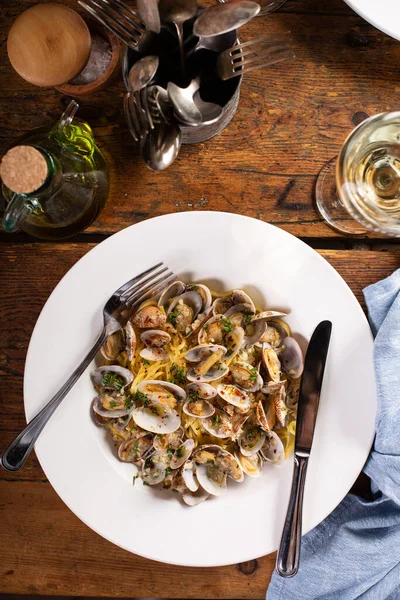Seafood pasta with clams, fresh pasta linguine in a bowl