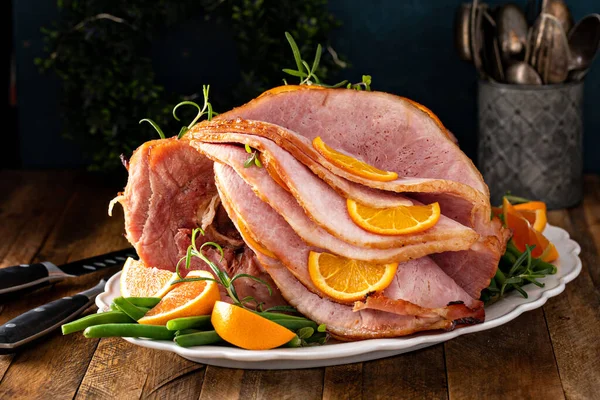Christmas Thanksgiving Spiral Sliced Ham Oranges Herbs Whole Ham Serving — Stock Fotó