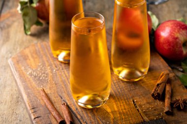 Apple cider mimosa for fall brunch, autumn cocktail or mocktail idea