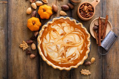 Pumpkin cheesecake swirl pie, fall or Thanksgiving dessert idea
