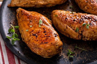 Roasted or seared chicken breast with herbs and spices