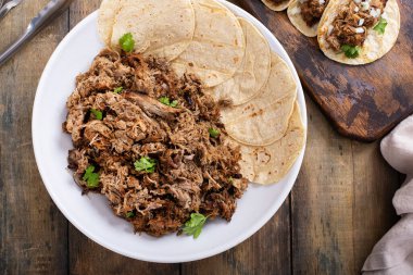 Mexican pork carnitas weith corn tortillas, ready to make tacos