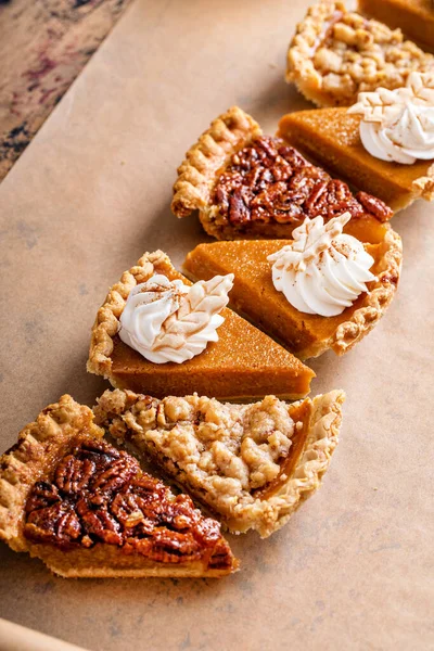 Traditional Fall Thanksgiving Pies Variety Slices Arranged Parchment Paper Pumpkin — Stock Fotó