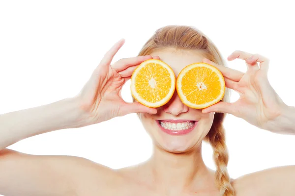 Mujer joven con naranjas —  Fotos de Stock