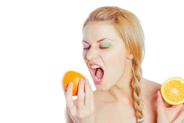 Young woman with oranges — Stock Photo, Image