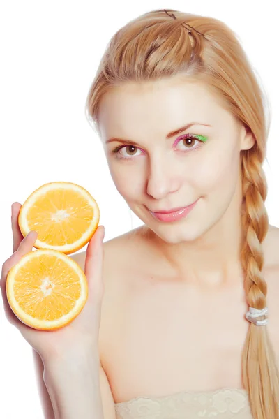 Young woman with oranges — Stock Photo, Image