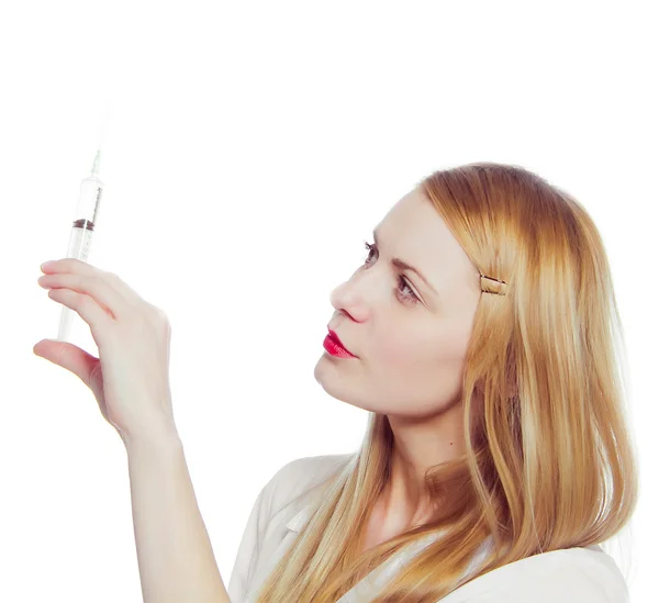 Krásná sestra s injekční stříkačkou — Stock fotografie