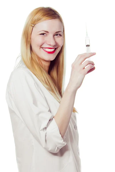 Krásná sestra s injekční stříkačkou — Stock fotografie