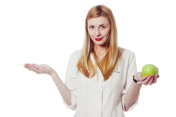Woman doctor with apple — Stock Photo, Image