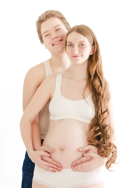 Мужчина с беременной женой — стоковое фото
