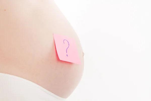 Pregnant woman with sticker — Stock Photo, Image