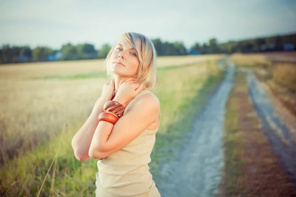 Image of young woman on the road — Stock Photo, Image