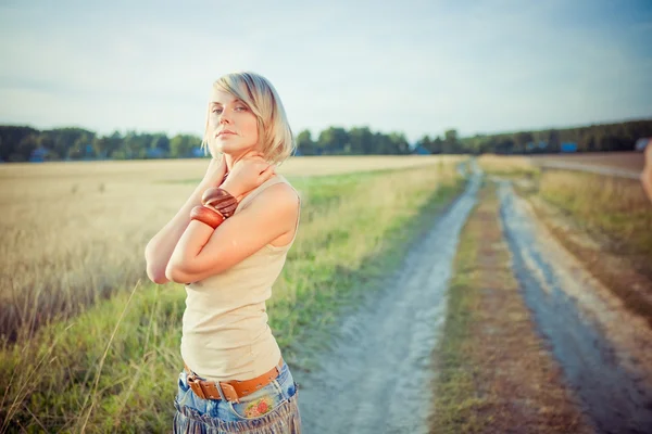 Image of young woman on the road — Stock Photo, Image