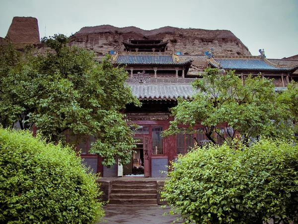Китай, Шаньсі: різьблення по Юньган каменю — стокове фото