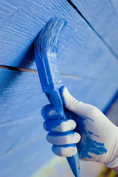 Pittura a mano muro di legno blu — Foto Stock