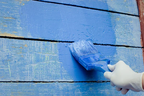 Hand blå målning trävägg — Stockfoto